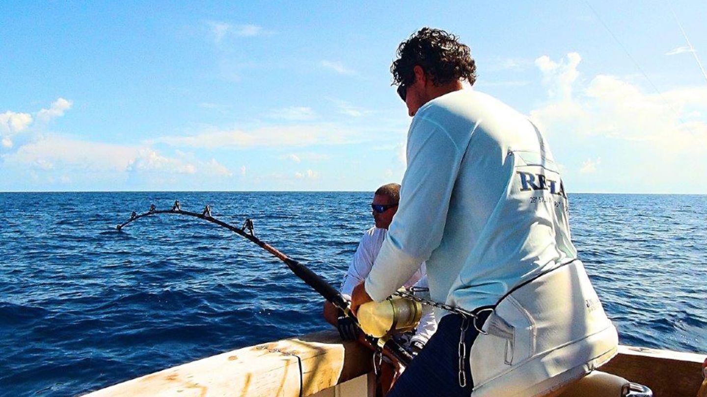 Jasen Gast fishing off back of Rehab