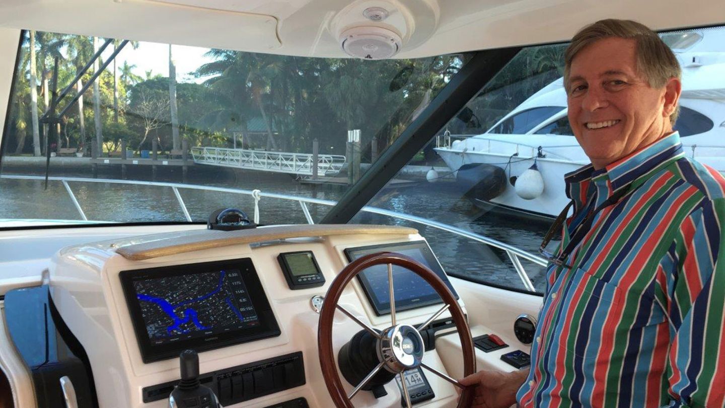 Rich Taylor at the helm of his 39 foot Tiara motor yacht