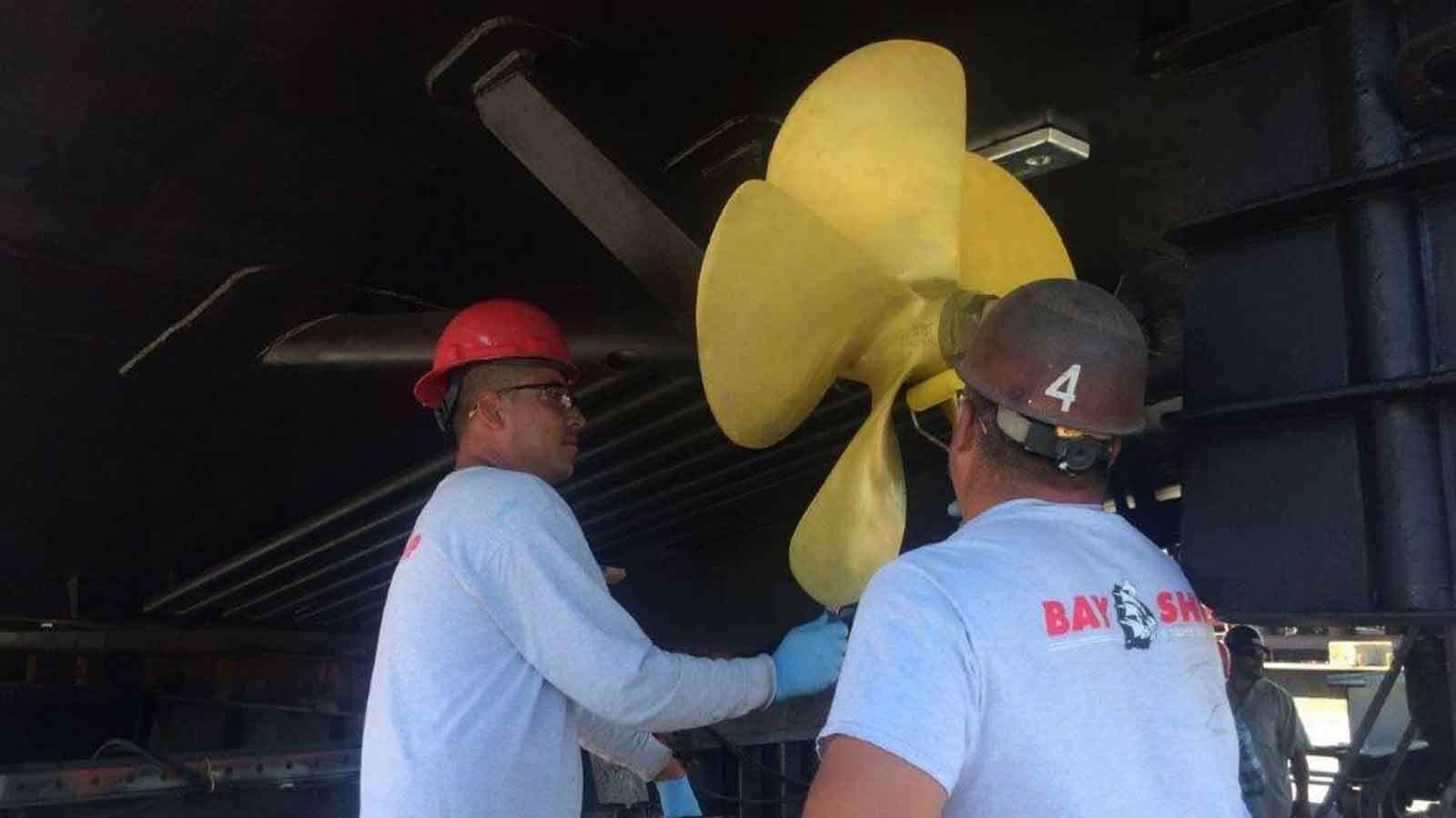 Experts-apply-Propspeed-to-a-propeller