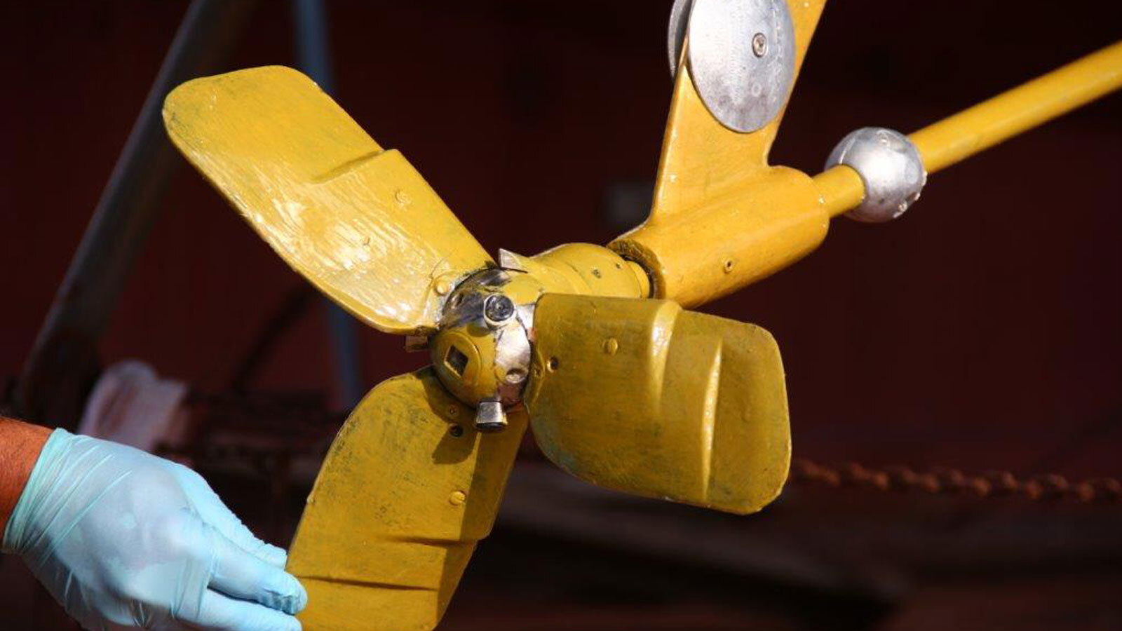 Patrick-Childress-applies-Propspeed-to-Brick-House's-foldable-Kiwiprop